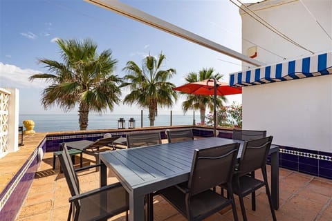 Private terrace with outdoor dining area and stunning sea views
