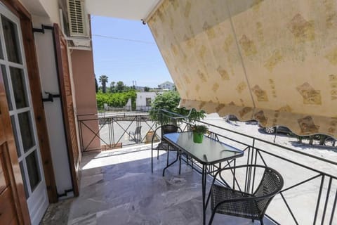 Private balcony with outdoor seating — perfect for morning coffee or an evening glass of wine.