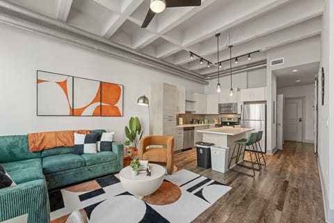 Vibrant decor and inviting space with sleek kitchen views—your Atlanta adventure starts here!