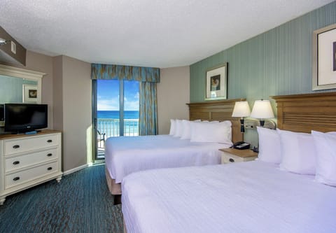 Settle into crisp beds and drift off to ocean breezes.