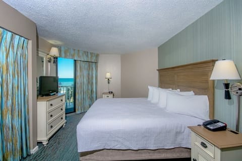 Sink into a plush king bed after sun-filled adventures.
