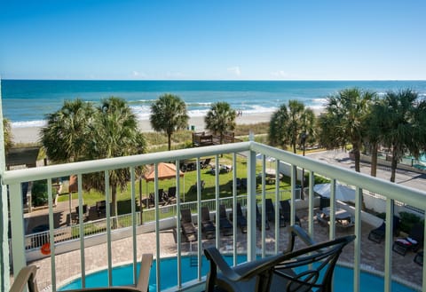 Take in poolside energy and panoramic ocean horizons outside.