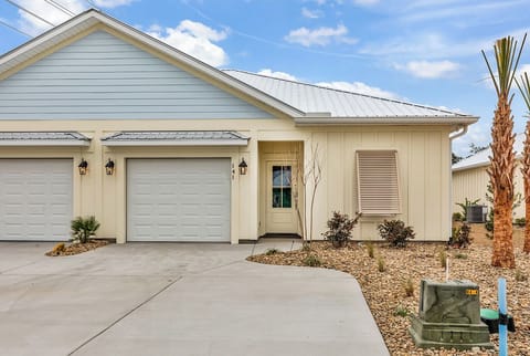 One car garage with driveway parking. Motorcycles allowed. 