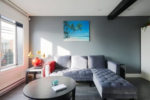 Bright open-concept living area with comfortable seating.