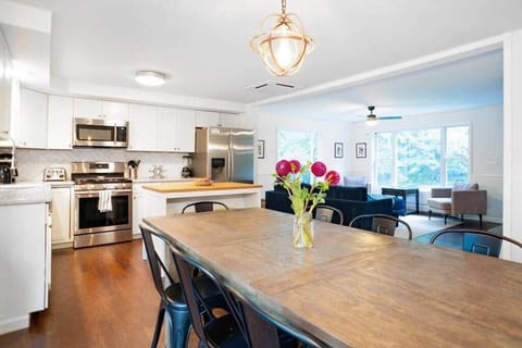 Enjoy the open layout design of the dining, kitchen, and living rooms