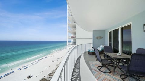 Enjoy the balcony with seating for everyone.