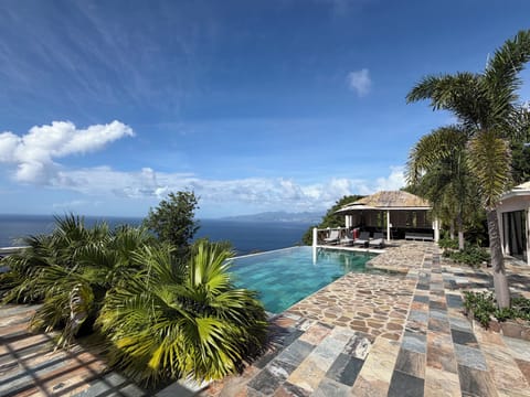 Poolside living - complete privacy & one of the island’s most dramatic outlooks