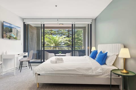 Bright bedroom with large window