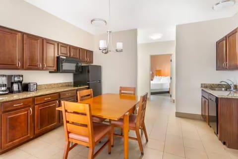 Gather for easy meals in a bright, fully equipped kitchenette.
