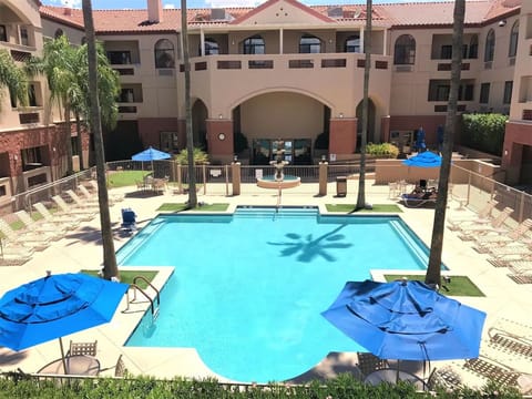 Bask in the courtyard pool with seating all around.