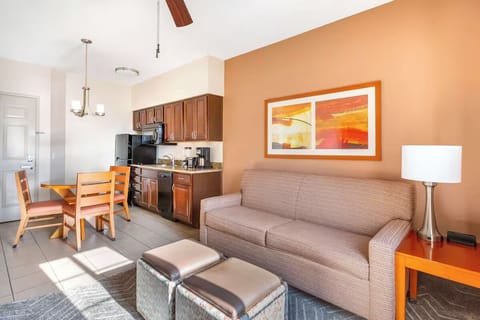 Gather for snacks and movies in this sunny suite.