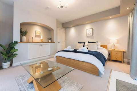 Stylish bedroom with king bed and soft lighting