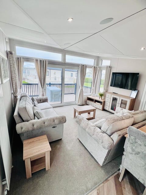 TV with free view options
Free WiFi
Board Game & Books Available 
Sliding Patio Door out to Veranda and outdoor seating area