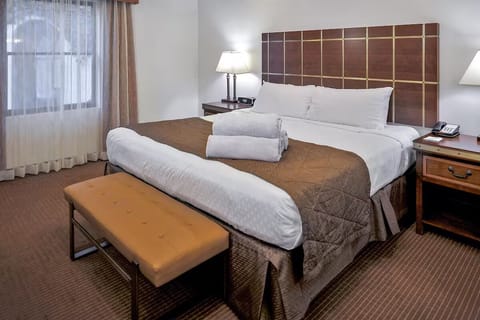 Unwind into crisp linens and enjoy a peaceful night’s sleep