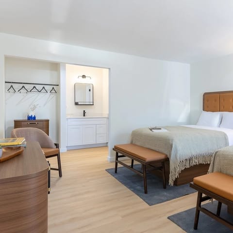 Spread out comfortably with open storage and a handy vanity nook.