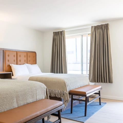 Wake up refreshed in an airy room with soft daylight.