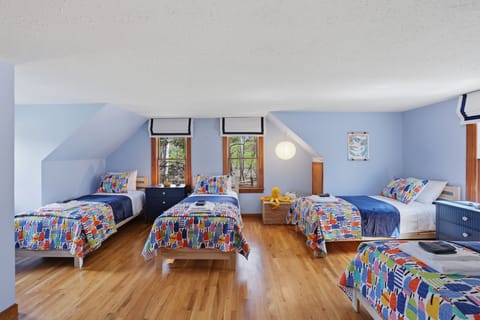 Little explorers' retreat. Twin-sized beds and golden light for joyful dreams.