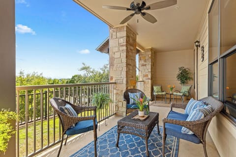Start your day with coffee on the furnished private balcony, offering peaceful Hill Country scenery and fresh Lake Travis air