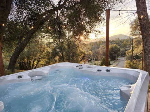 Relax in the always-heated hot tub and watch the sun set.