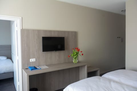 Settle in with a spacious desk and easy TV viewing.