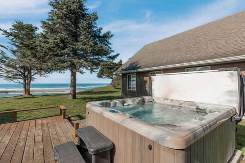 Soak in bubbling waters while watching waves crash just steps away. This oceanfront hot tub offers unmatched relaxation with panoramic beach views.
