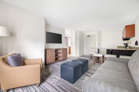 Spread out in the open-plan suite with space to lounge.