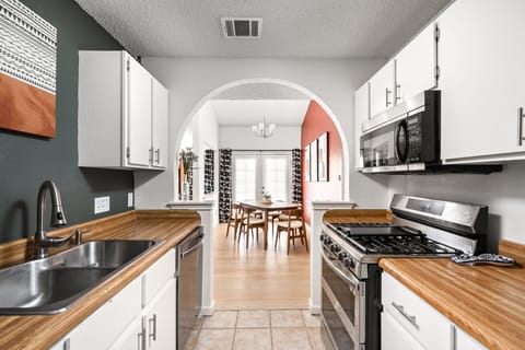 Cook and connect in a bright, inviting kitchen that flows effortlessly into the dining space. It’s designed for easy meals, shared moments, and feeling completely at home.