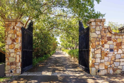 A grand, secure entryway setting the tone for exclusive resort‑style living.