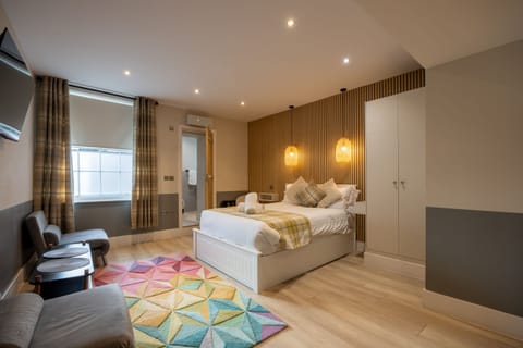 Studio sleeps 4 guests: 2 adults and 2 children comfortably.