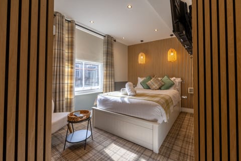 Chic studio featuring plush carpet and modern decor