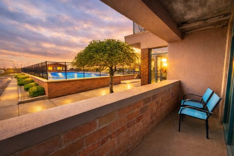Private patio with peaceful outdoor seating and beautiful sunset views. Enjoy fresh air, quiet surroundings, and a relaxing atmosphere just steps from your living space.