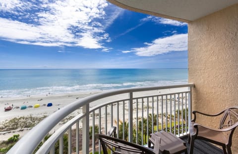Step onto the balcony and breathe in salty ocean air.