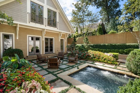Private courtyard w/ lounge seating & greenery for relaxed outdoor moments