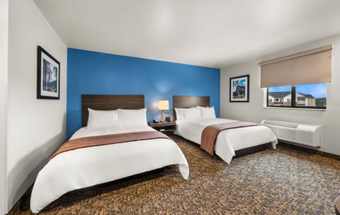 Stretch out and relax in a bright room with two beds.