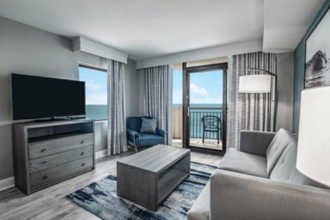 Relax on the sofa while ocean breezes flow inside.
