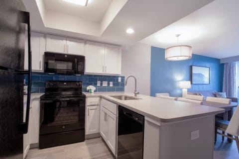 Cook easy meals in a bright, modern open kitchen.