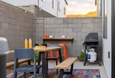 Outdoor Dining Oasis: Gather around the stylish table for meals under the stars and sunset views!