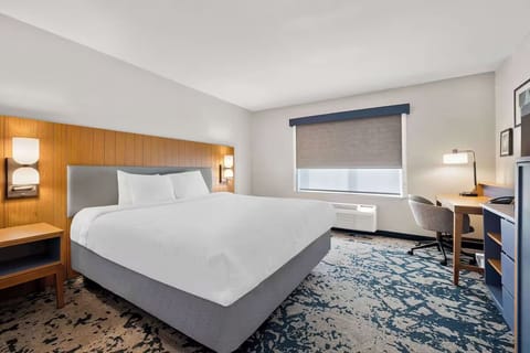 Settle into a bright king room with dedicated workspace.