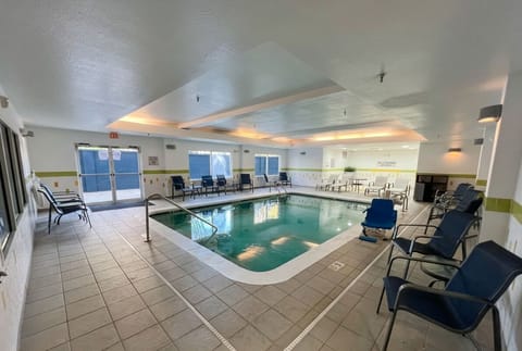 Dive into a relaxing indoor swim in a spacious room.