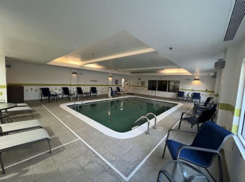 Settle into poolside seating and enjoy a quiet swim break.