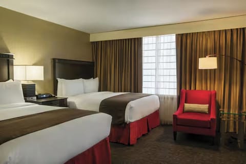 Stretch out with two plush beds and warm, calming lighting.