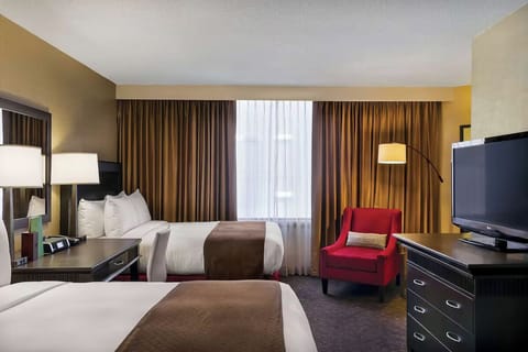 Unwind after adventures in a quiet, softly lit double room.