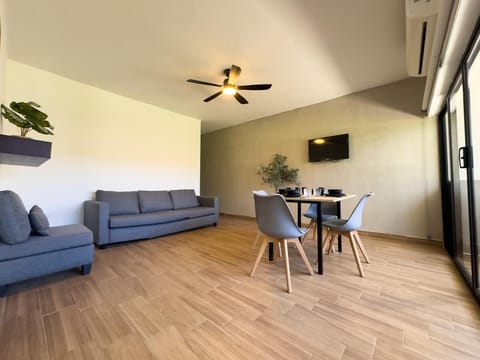 Spacious living room with modern seating and natural light