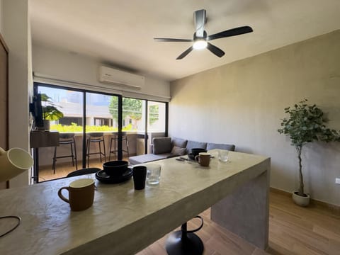 Bright dining area with scenic outdoor views and cozy seating