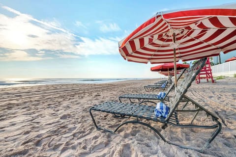 Stretch out on beachfront loungers and listen to the surf.