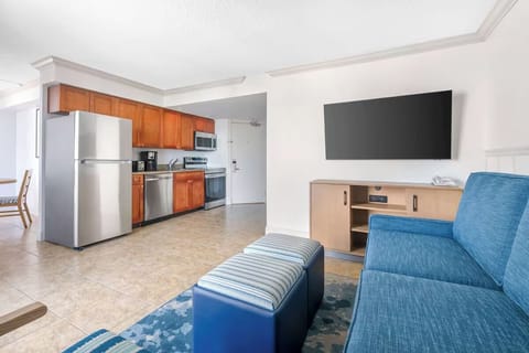 Gather together in an airy suite with open-plan living.