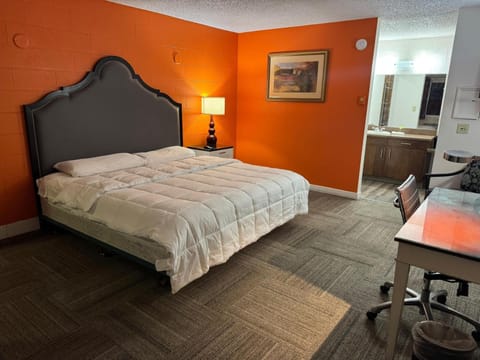 Relax into a cozy, well-lit bed for restful nights.
