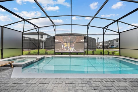 Discover your private oasis with a sparkling pool and elegant paver deck. The spacious screened enclosure lets you enjoy the outdoors while shielding you from the elements. Unwind in this serene setting and bask in the sun.