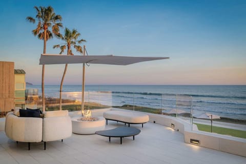 Gated Malibu beachfront on Broad Beach with direct sand access and wide shoreline.