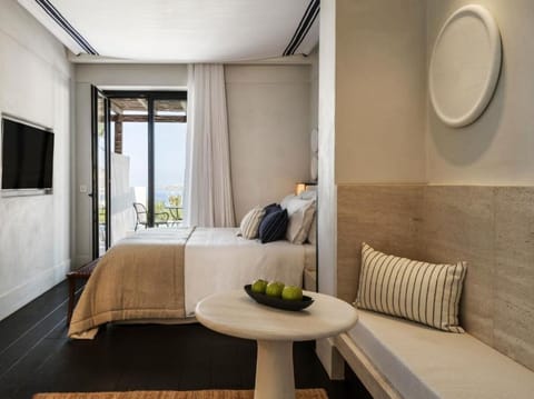 Wake up to bright coastal light and a breezy terrace.